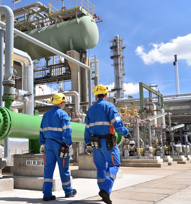 Industrial plant operations team at site